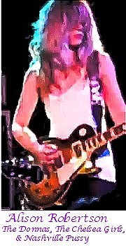 Image of Allison Robertson of The Donnas playing guitar