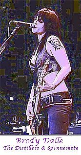 Image of Brody Dale of The Distillers & Spinnerette playing guitar
